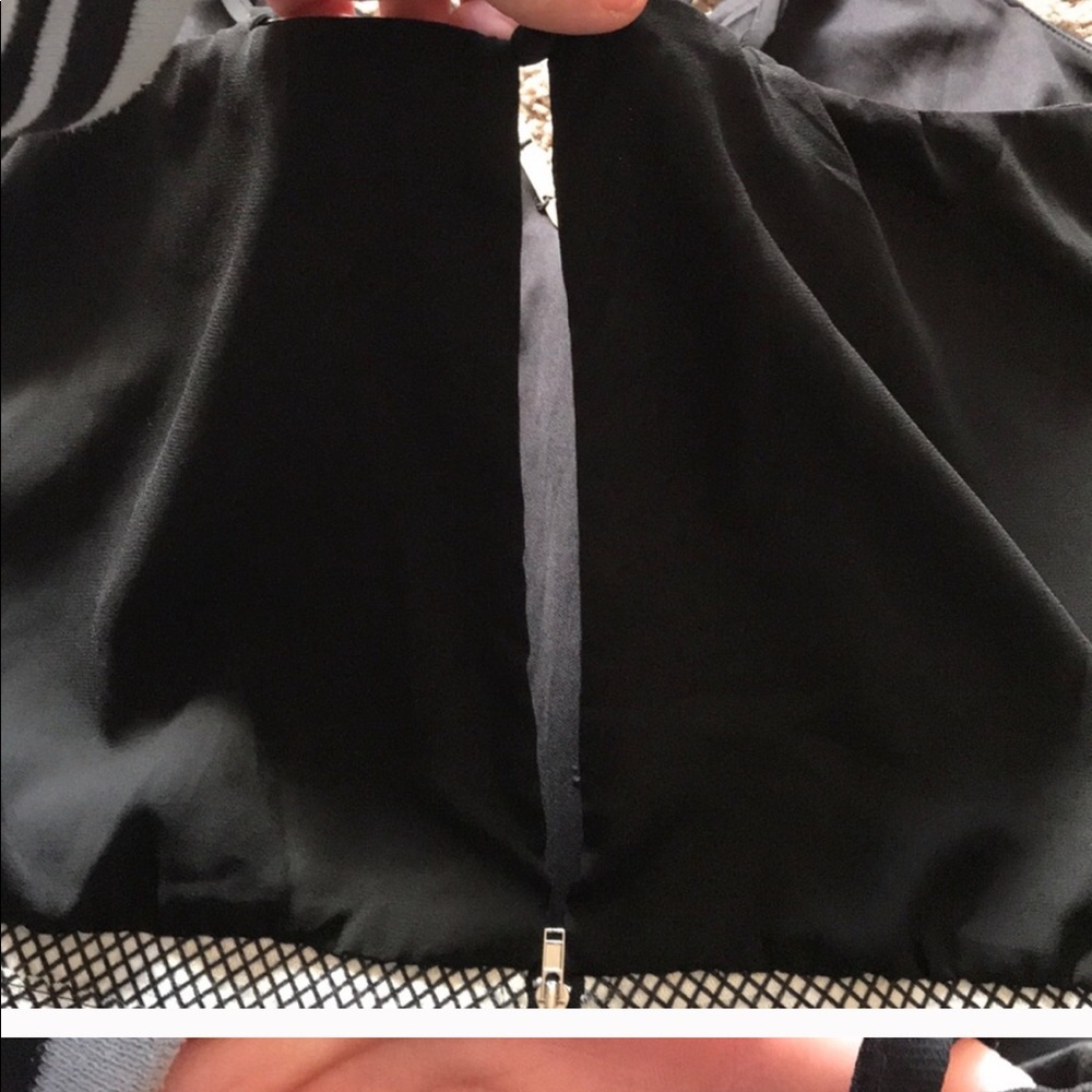 A Lulumari black open back Romper - Picture 7 of 8